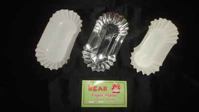white and silver paper tray or plates for sausages and kikiams